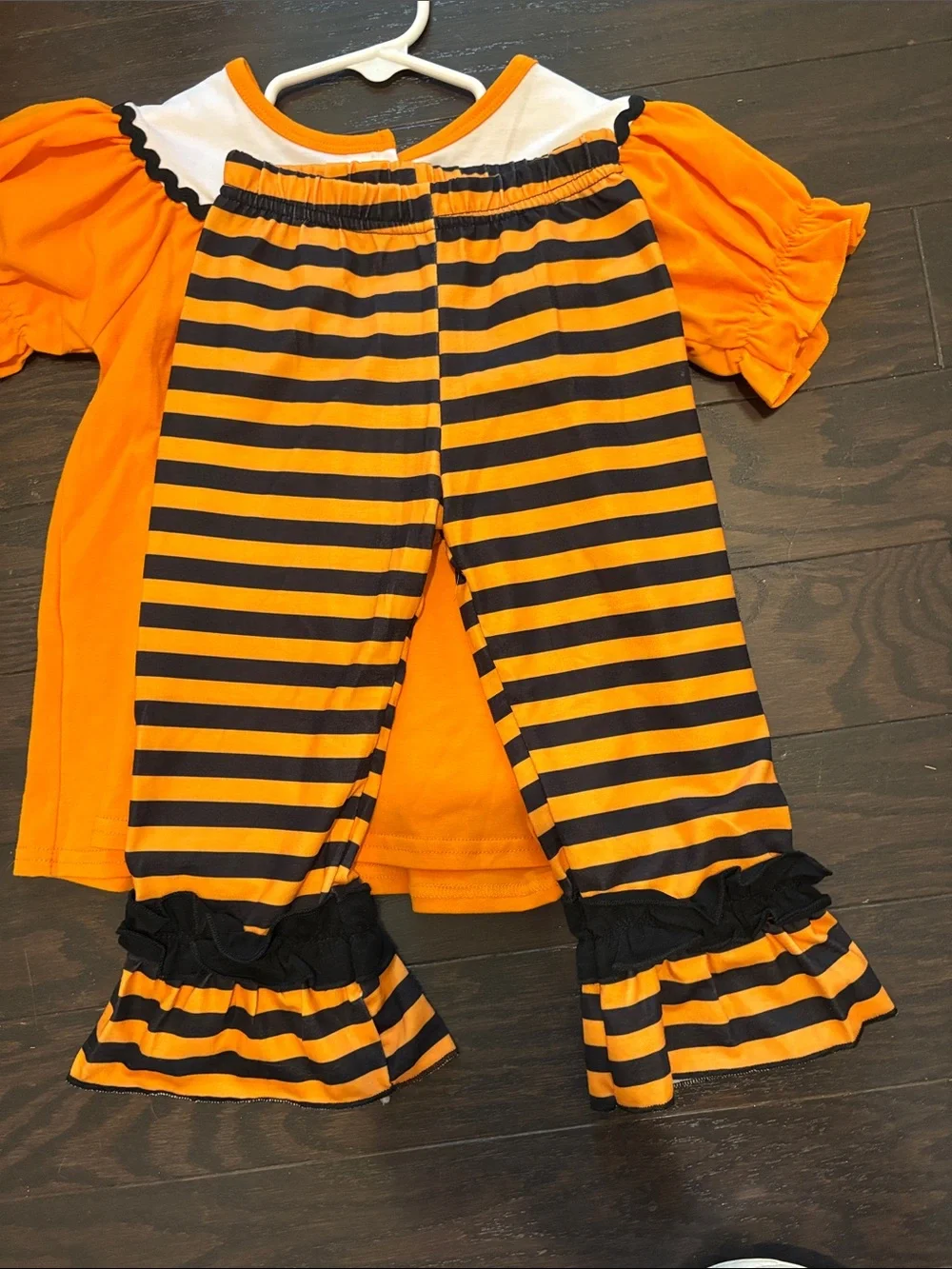 Girls Orange Pumpkin & Spider Ruffle Top with Orange/Black Striped Flare Bottoms